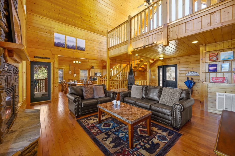 Main level living spaces-Living Room, Kitchen, stairs up- Loft, down-Game Room