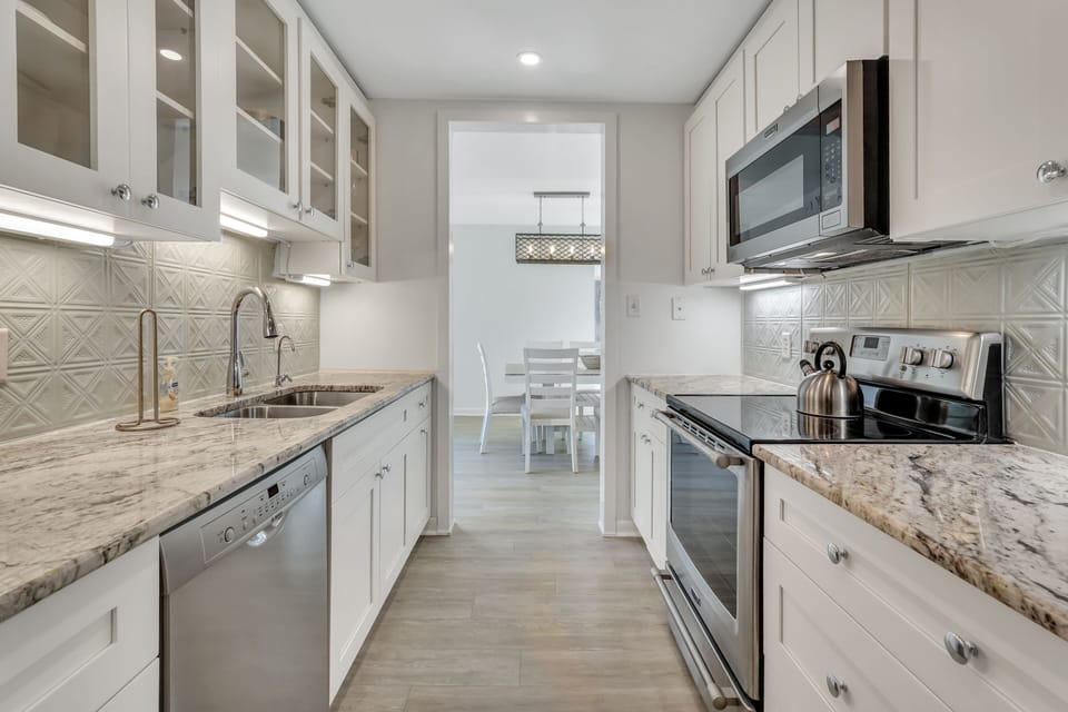 Kitchen featuring all stainless steel appliances