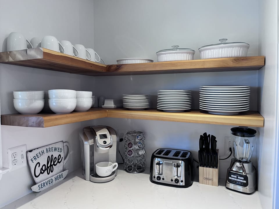 Service for 12, appliances, k-cup and 12 cup coffee maker. (Coffee provided)