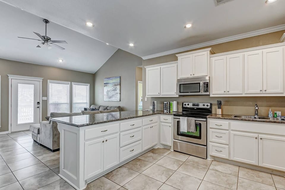 The fully stocked kitchen includes a coffee maker and a blender for smoothies or margaritas