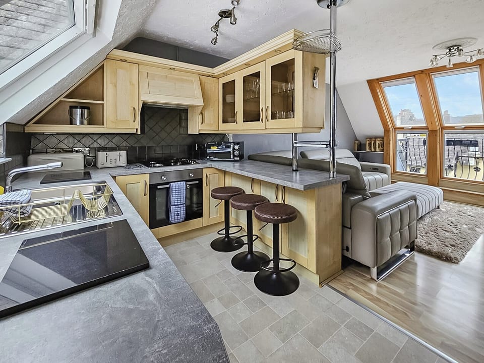 Fully equipped open plan kitchen and living area | Newfold Cottage, Bowness-on-Windermere