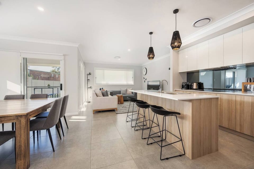  The well-equipped kitchen offers everything you need to cook up a feast at home, as well as casual dining at the breakfast bar.
