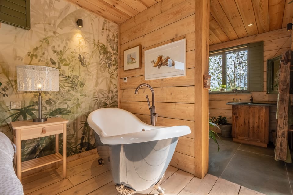 Olive Tree House, Sussex: The decadent slipper bath in the bedroom suite