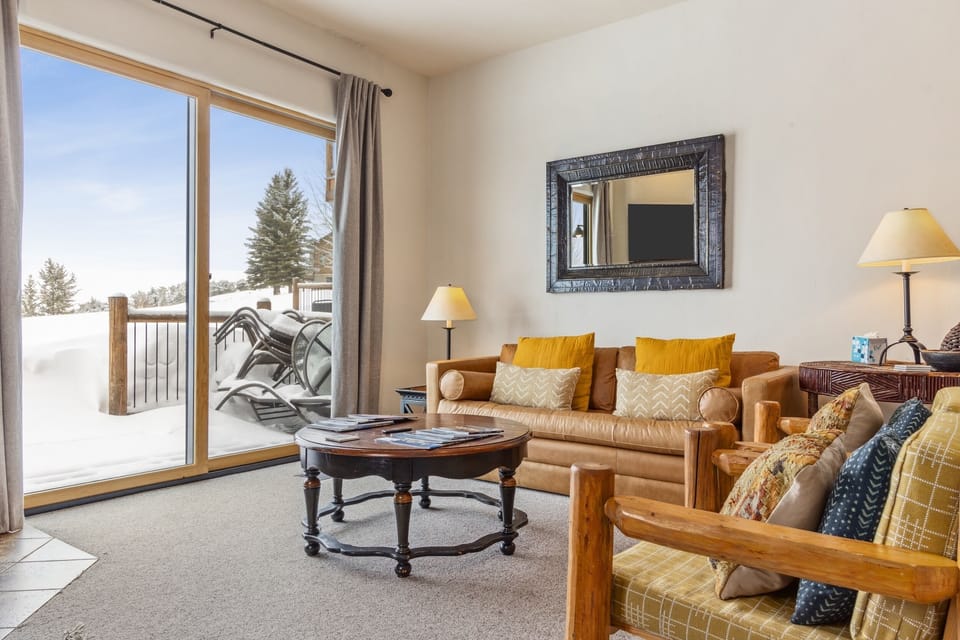 Living Room with Teton Views and wood burning fireplace