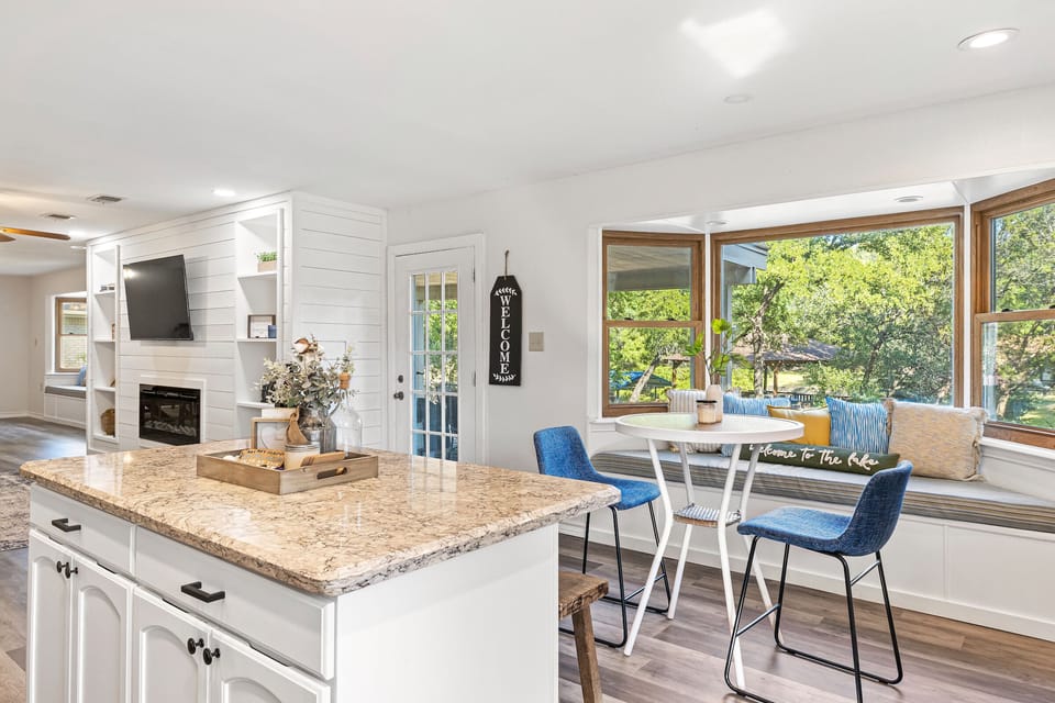 Newly renovated kitchen with a lot of natural light and additional dining space