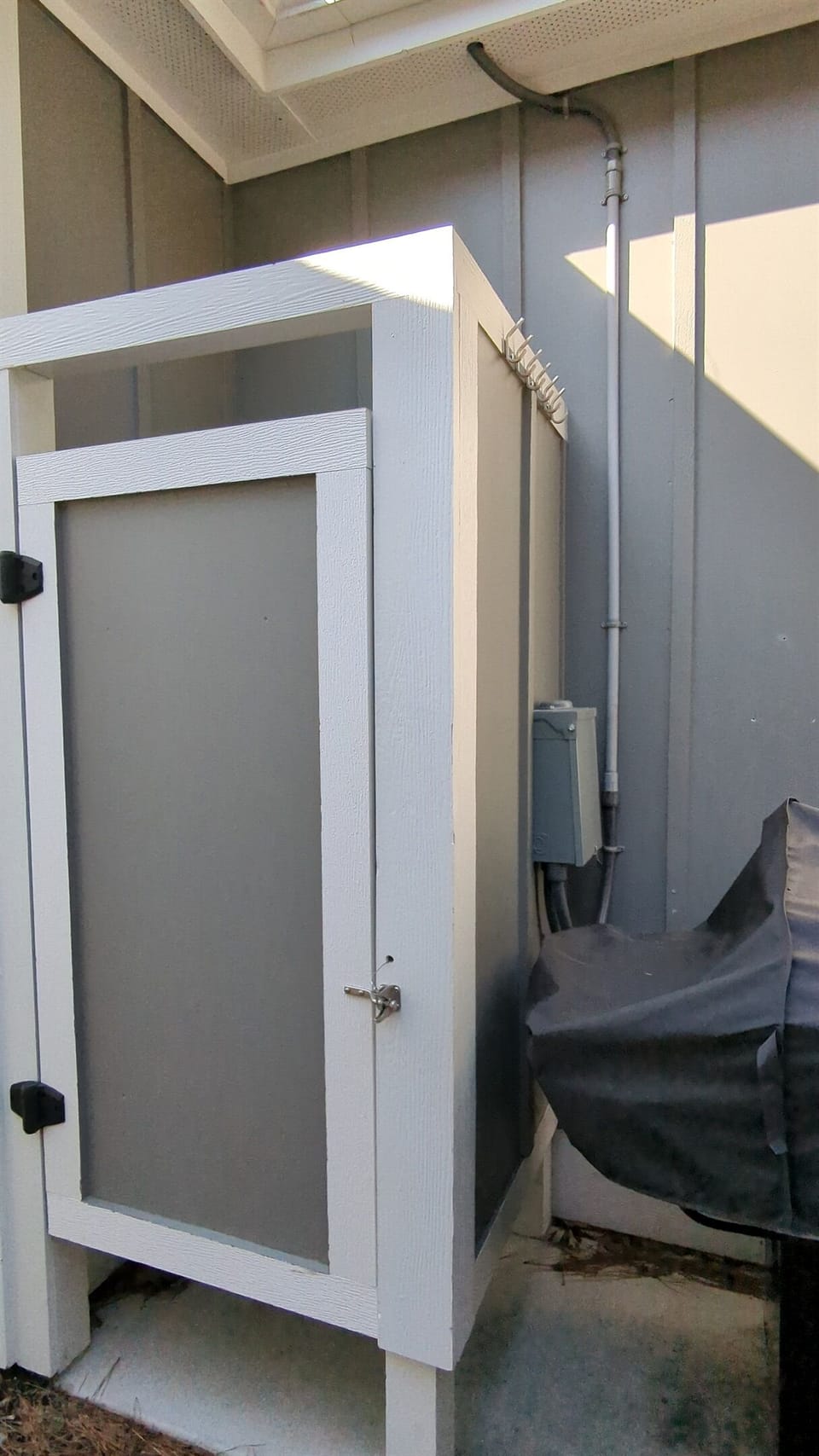 Outdoor shower for rinsing off after the beach or hot tub.