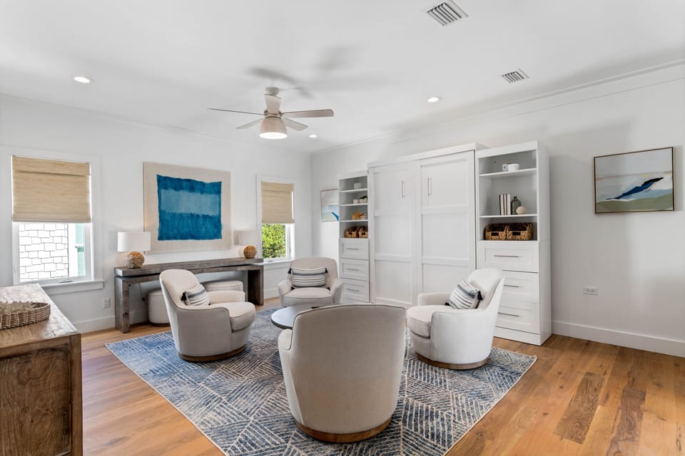 Loft with Queen Murphy bed (pull down bed). 4 swivel chairs and table.