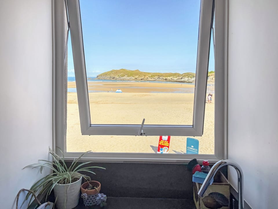 Looking out the kitchen window! Cooking with a perfect view! | Pennti Treth - Quarter Deck Apartments, Porth, near Newquay