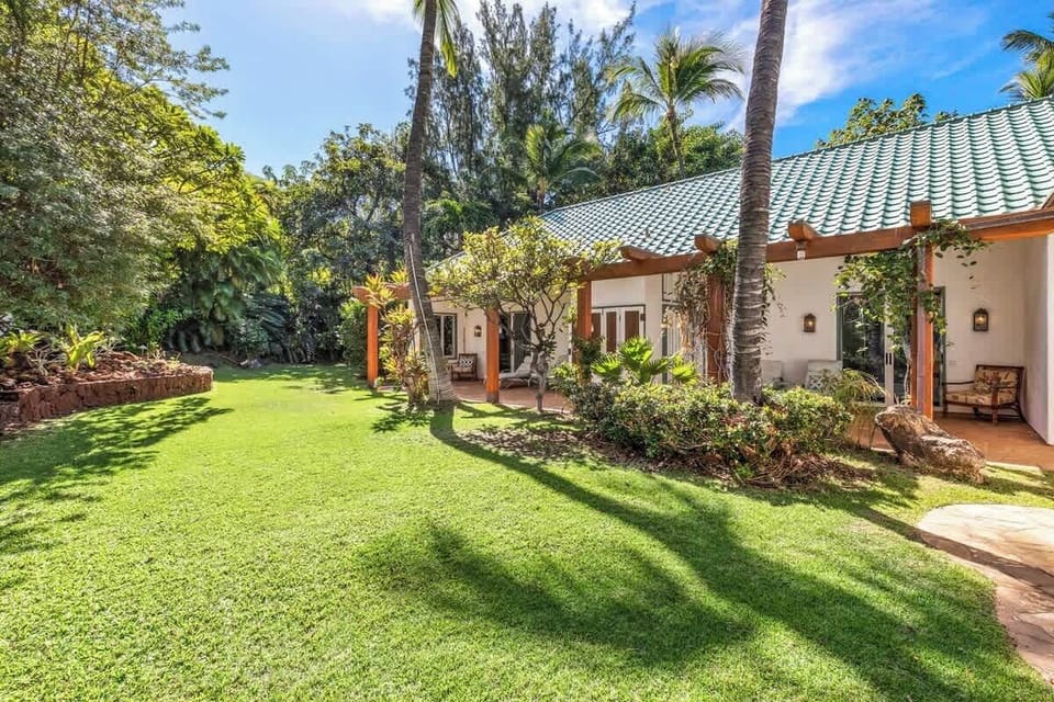 Wide view of trellised lanais adjoining two bedrooms