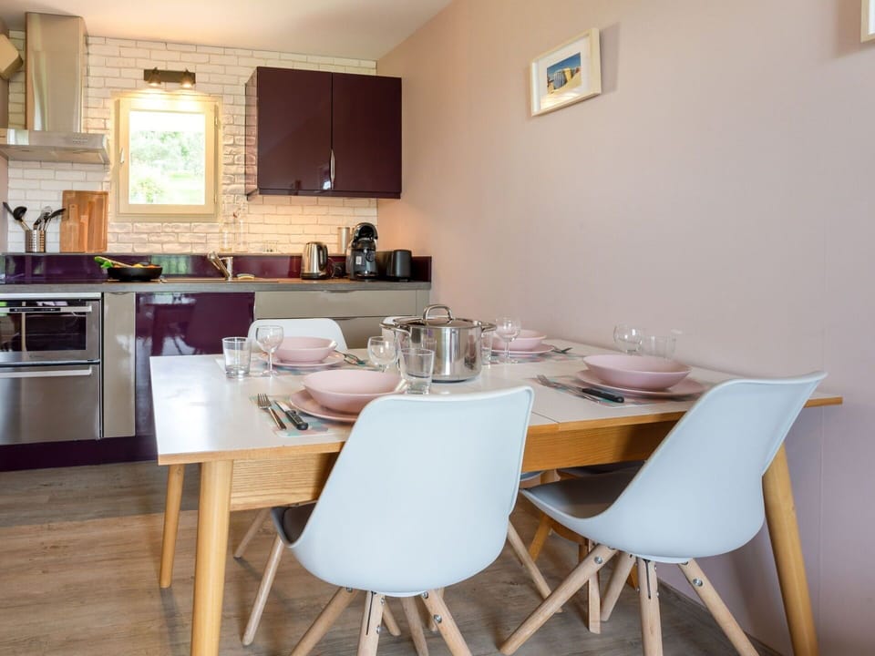Furniture, Property, Table, Cabinetry, Countertop, Chair, Picture Frame, Wood, Lighting, Interior Design