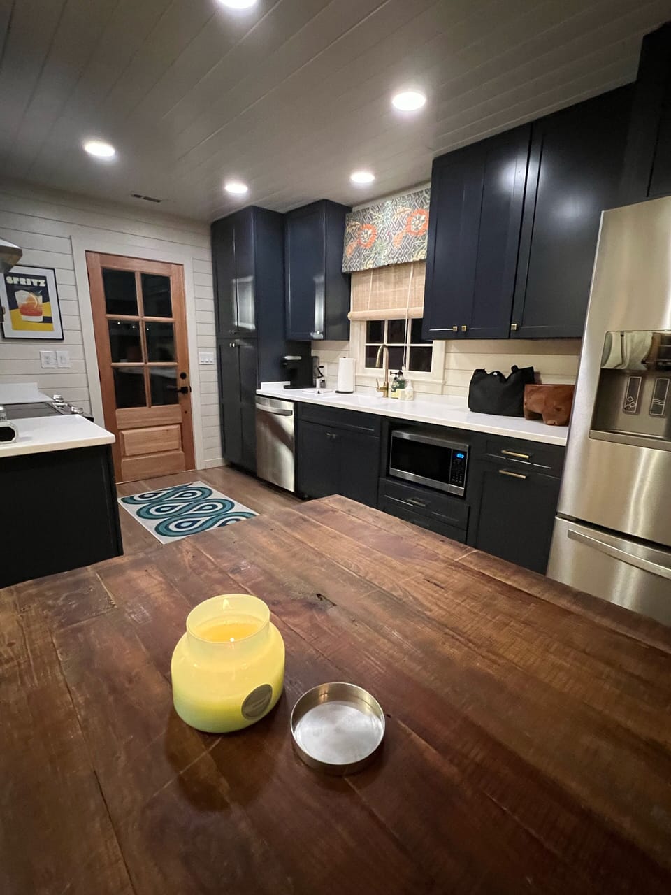 View to kitchen from farm table dining
