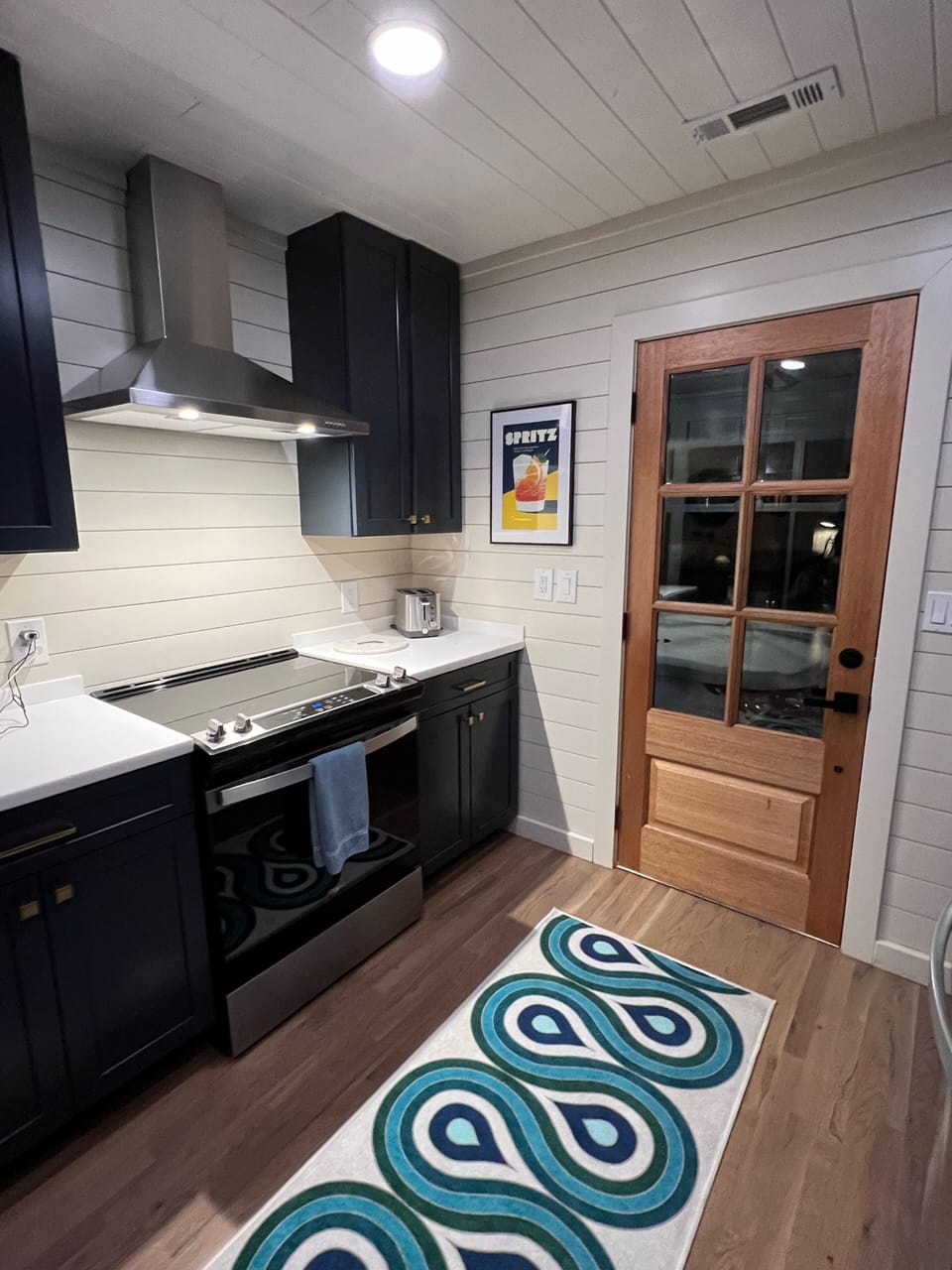 New kitchen and appliances. Door to screened porch. 