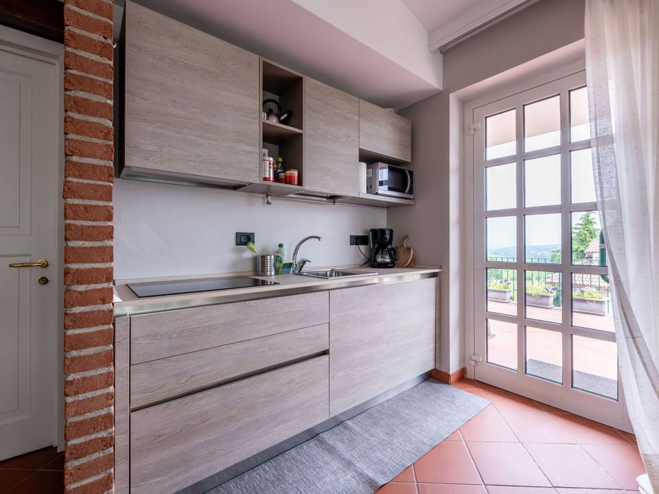 Property, Cabinetry, Window, Countertop, Wood, Interior Design, Shelf, Architecture, Floor, Shelving