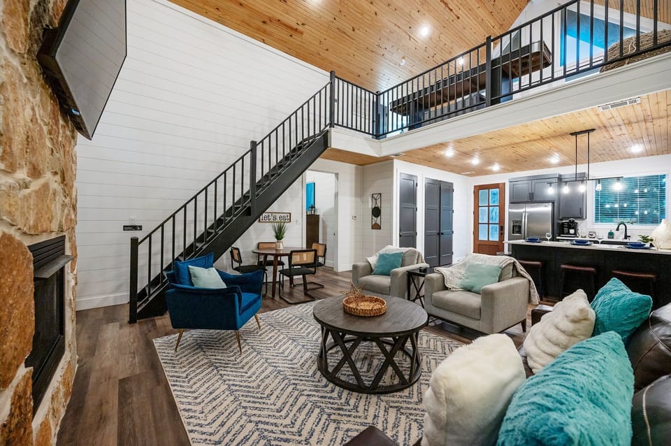 Whether it’s a quiet night by the fire or lively conversations, this spacious living room sets the stage for unforgettable moments.