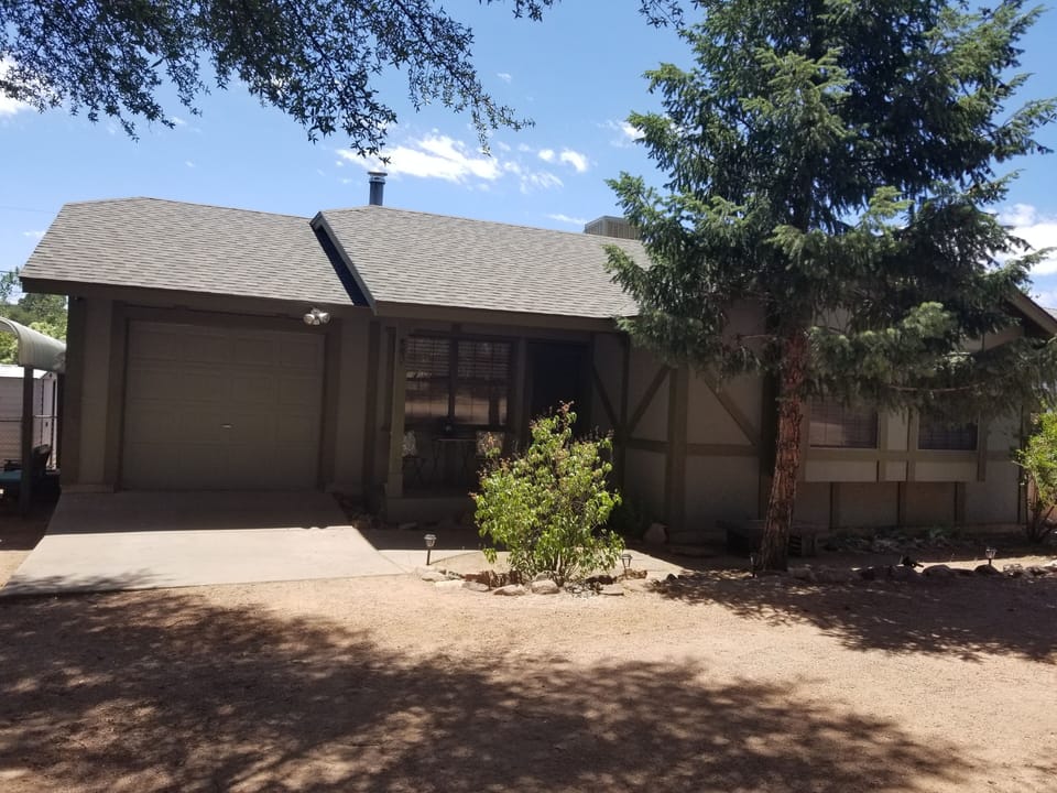 The garage is not available to guests. There is a carport available for use. 