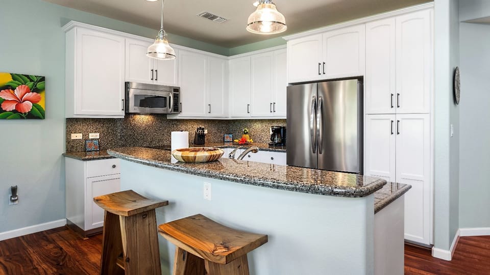 2 bar stools at the kitchen counter