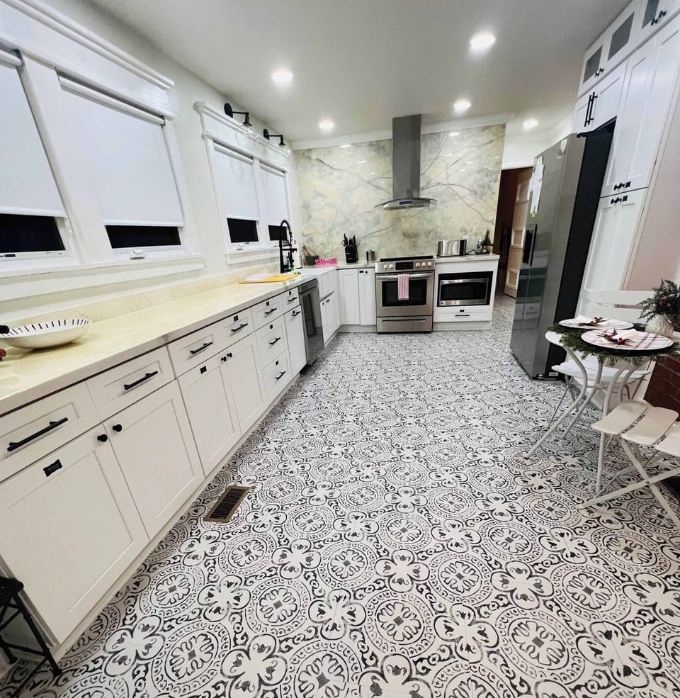 You will love gazing out the kitchen windows at the swaying pine trees as it's a peaceful view that makes even doing the dishes feel relaxing, giving you a sense of calm and space as you cook.