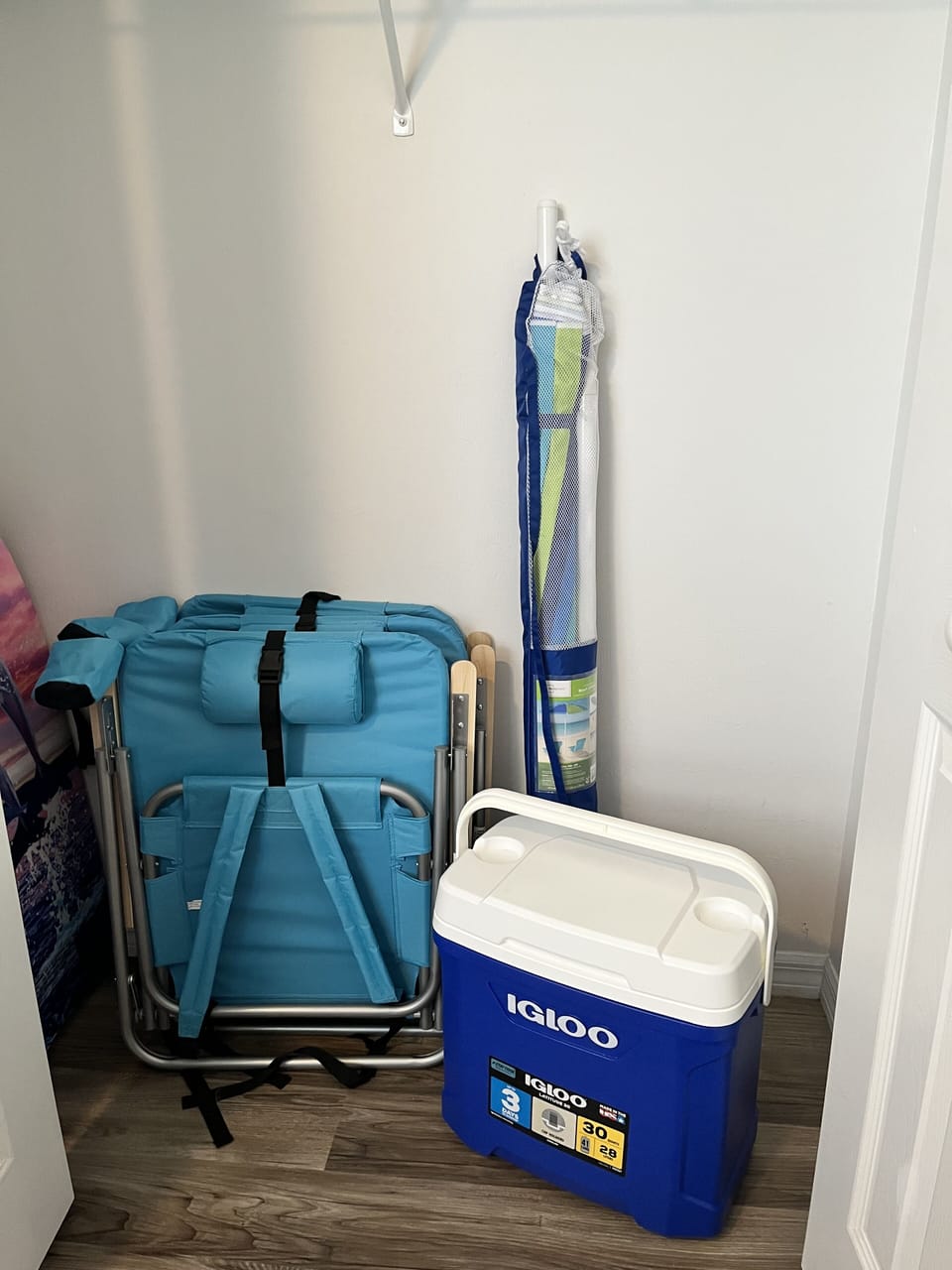 Beach chairs, beach umbrella, 2 coolers, beach/pool towels, and utility cart.
