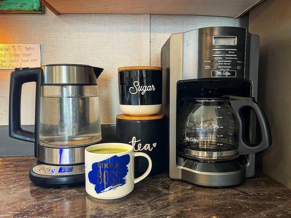Tea kettle, sugar, coffee, tea, coffee maker and all the kitchen essentials you may need...