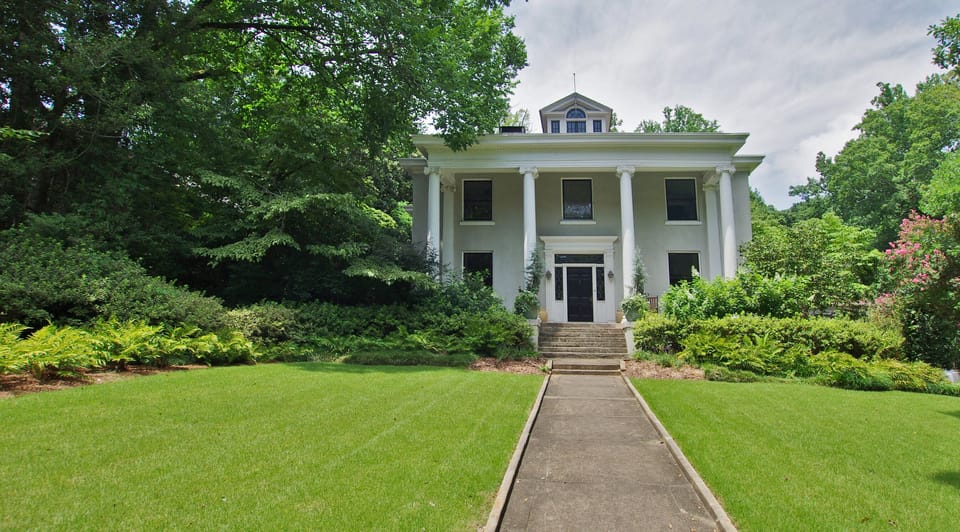Main House with Carriage House separate and behind main house with private entry