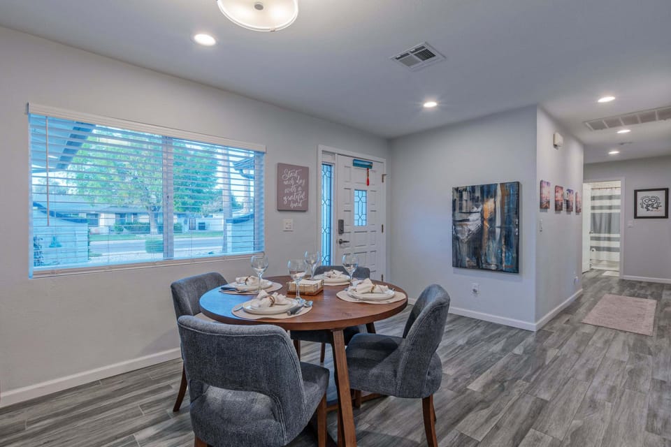 Front foyer opens into dining area and bedroom hallway.