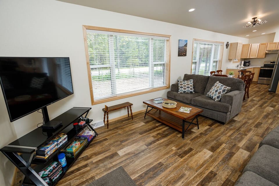 Comfort and open windows enable guest to relax with a view
