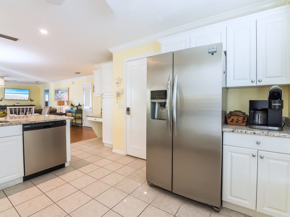 Fully stocked kitchen with stainless steel appliances