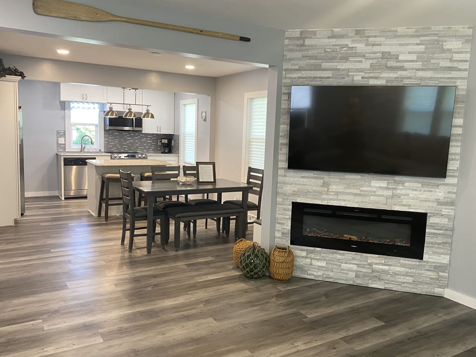 Great room, facing the dining area and kitchen. 