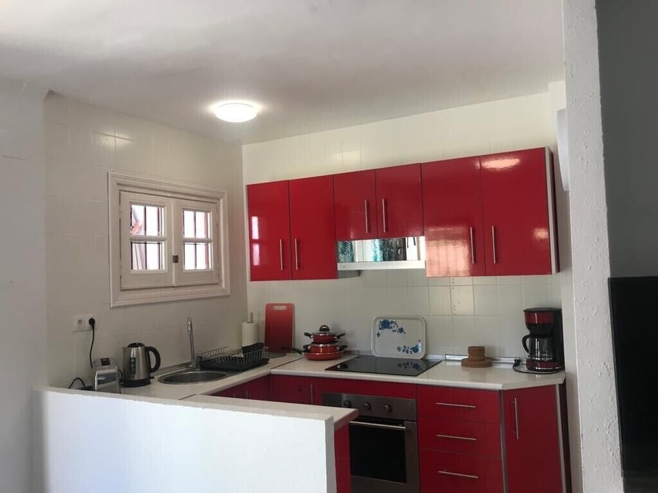 Open plan kitchen with new appliances 
