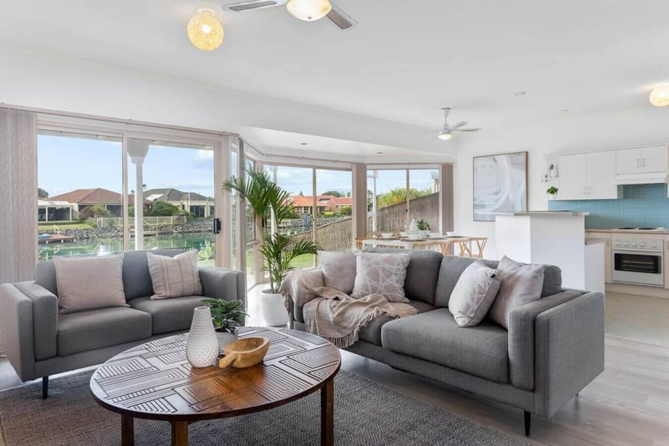 Our minimalist living room: a soothing blend of white and gray tones, perfect for unwinding.