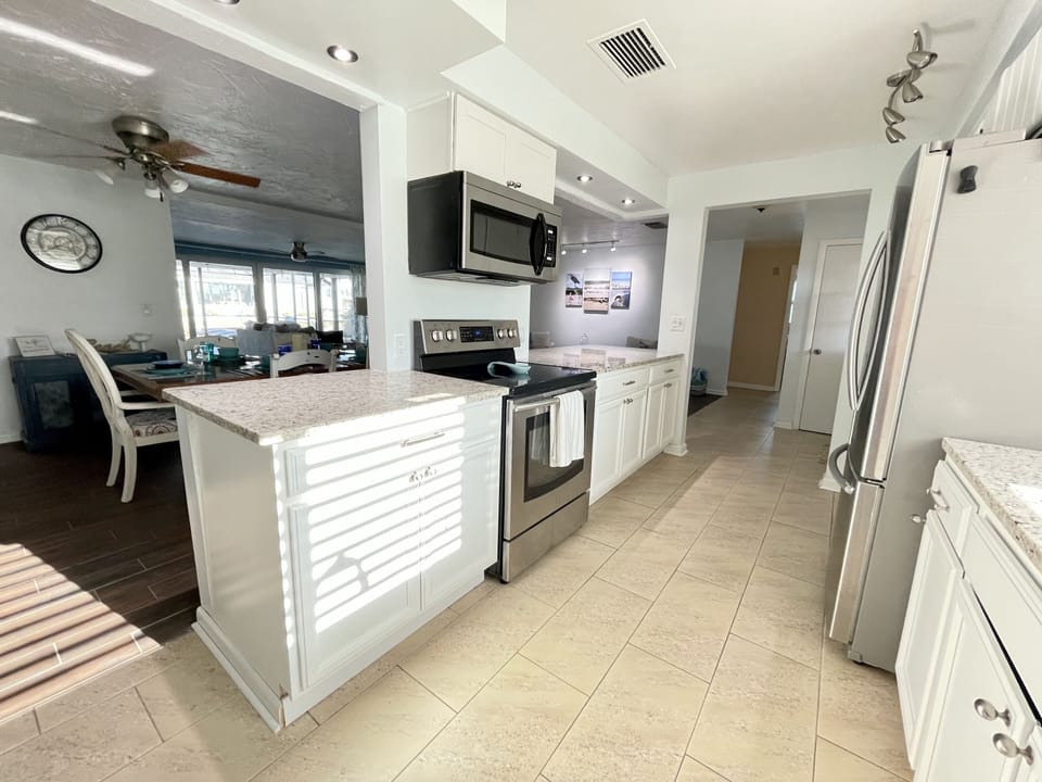 Prepare meals in the fully equipped kitchen. 