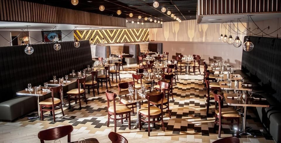 Savor elevated dining in a warm, stylish restaurant setting.