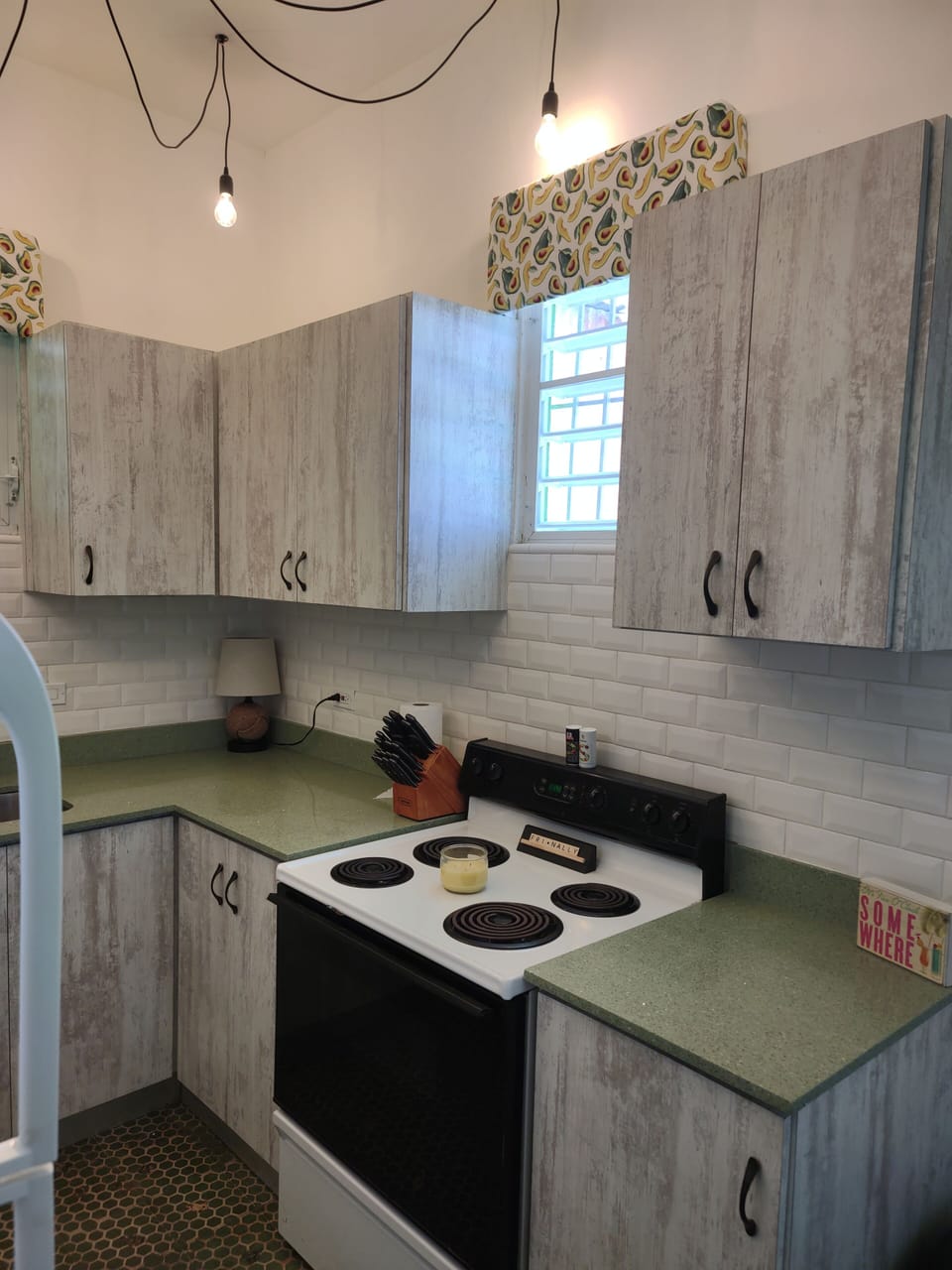 4 burner stovetop, oven, refrigerator, freezer, microwave and double sink