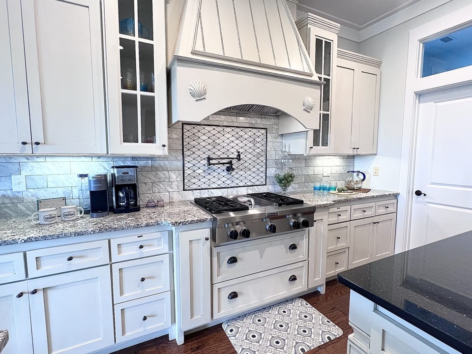 Chef’s kitchen, gas stove, pot filler spicket, TONS of storage, huge pantry