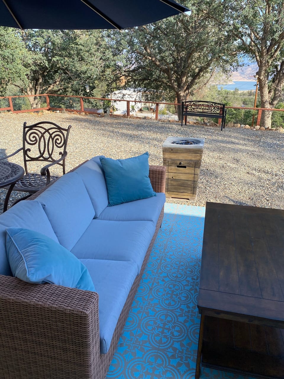 Relax or work remotely from the front patio of our lake view cabin.