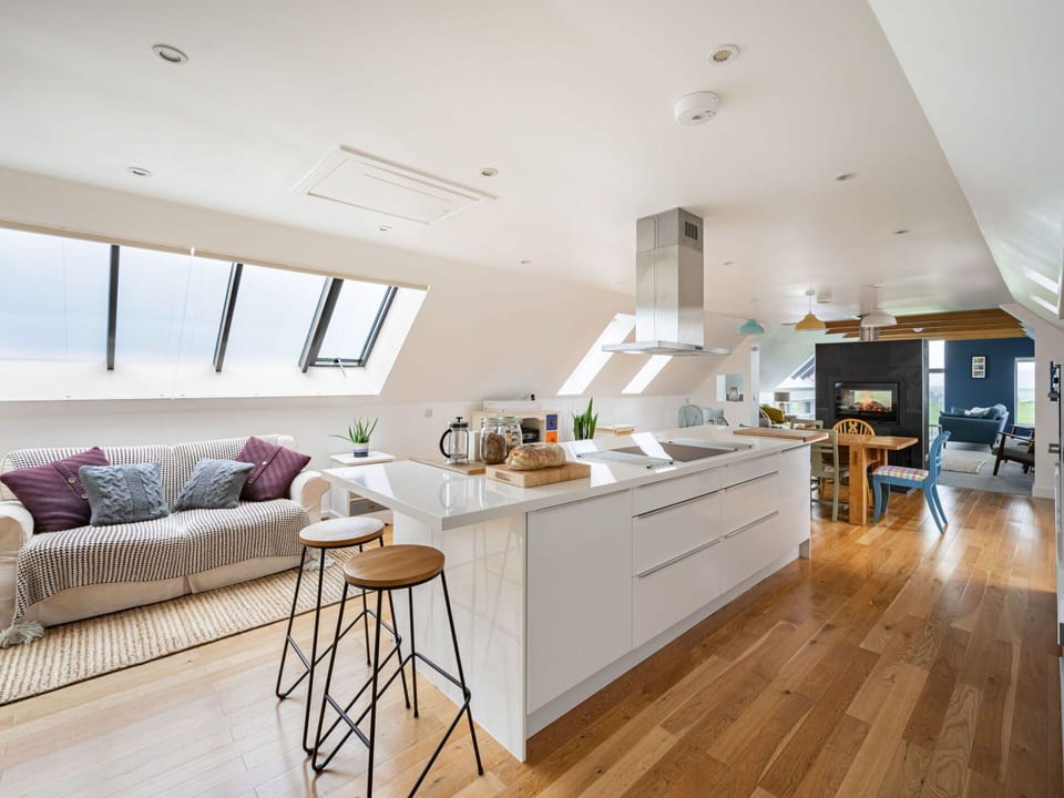 Furniture, Cabinetry, Building, Countertop, Table, Wood, Couch, Kitchen, Window, Flooring