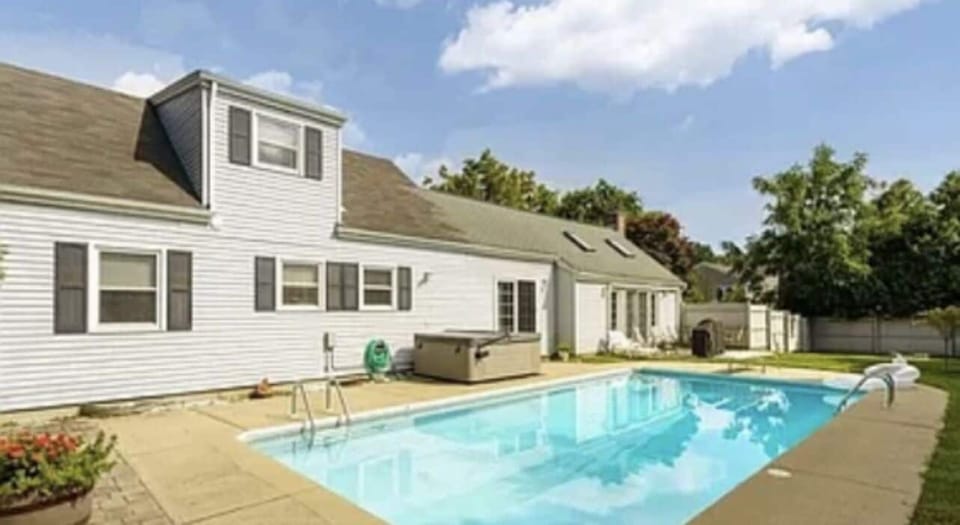 Backyard with Salt Water Pool, Hot Tub, and Fire Pit