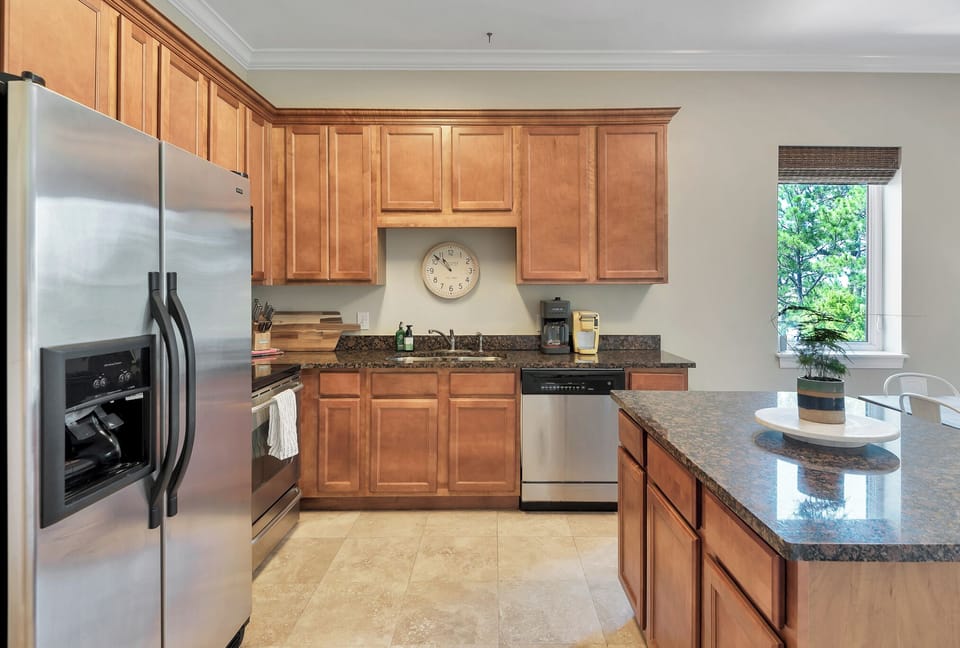 Fully stocked kitchen with island.