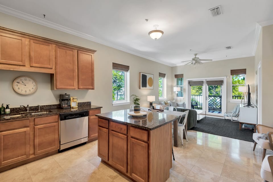 Kitchen opens to the living and dining area.