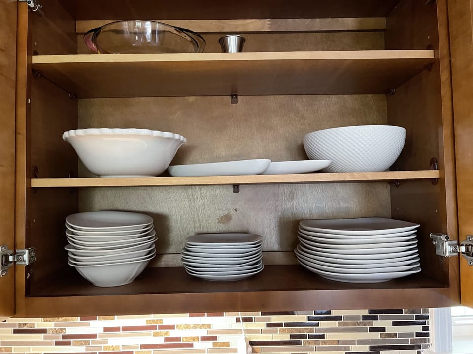 White porcelain dining set 10 of each and under cabinet lighting