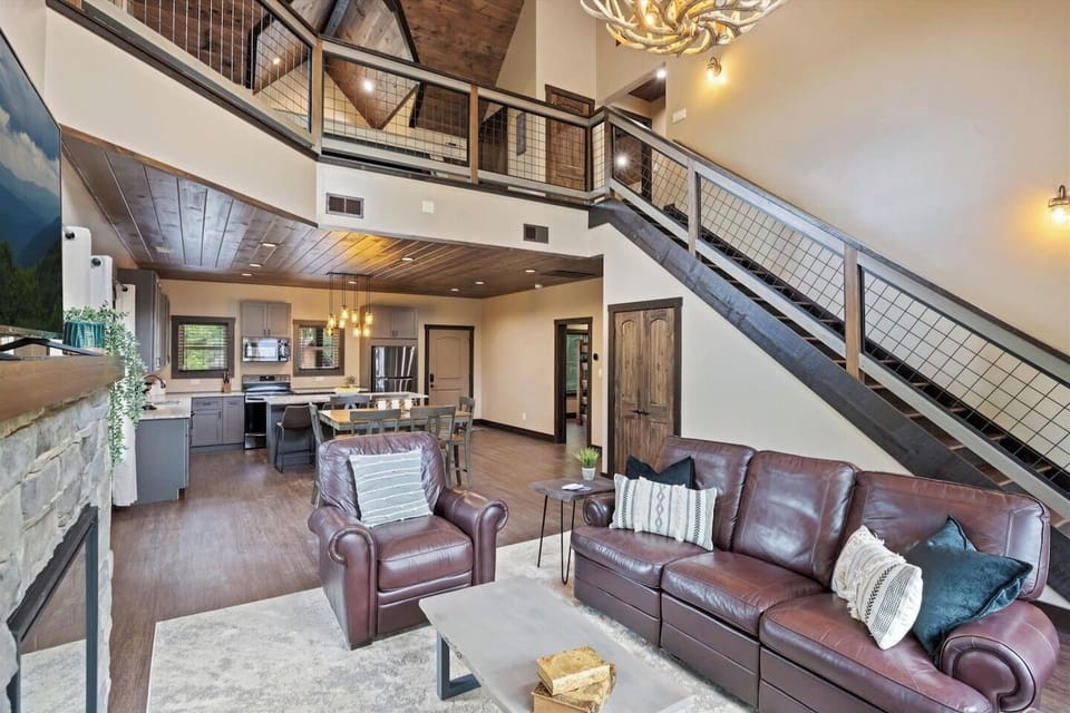 Large living area with electric fireplace & smart TV!