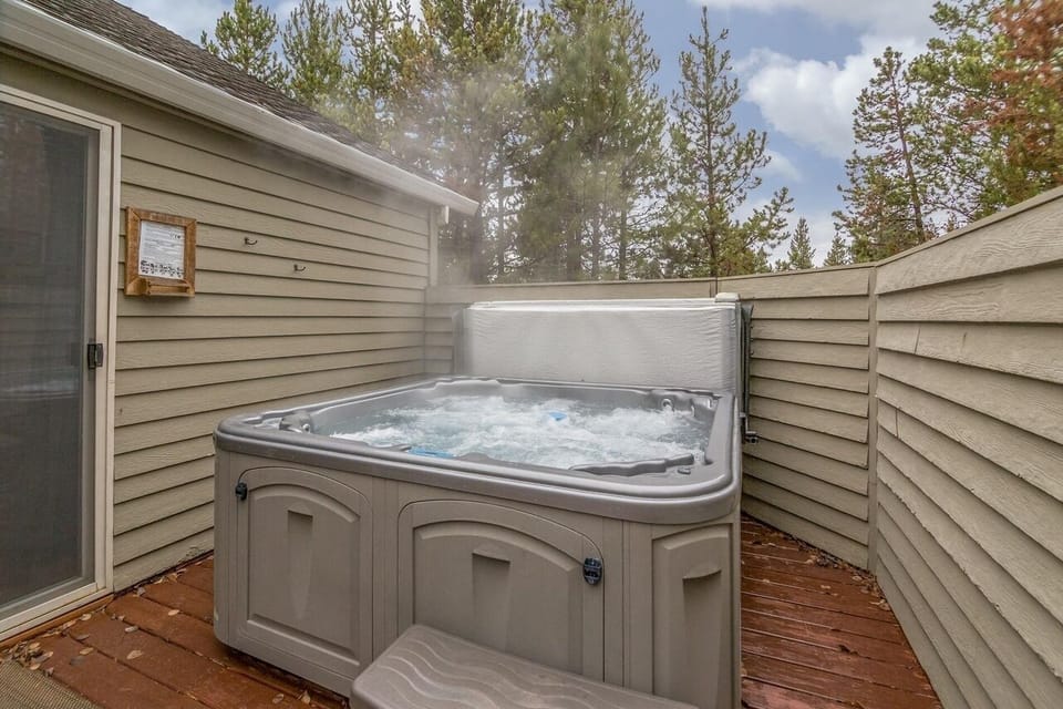 Hot tub with privacy fencing