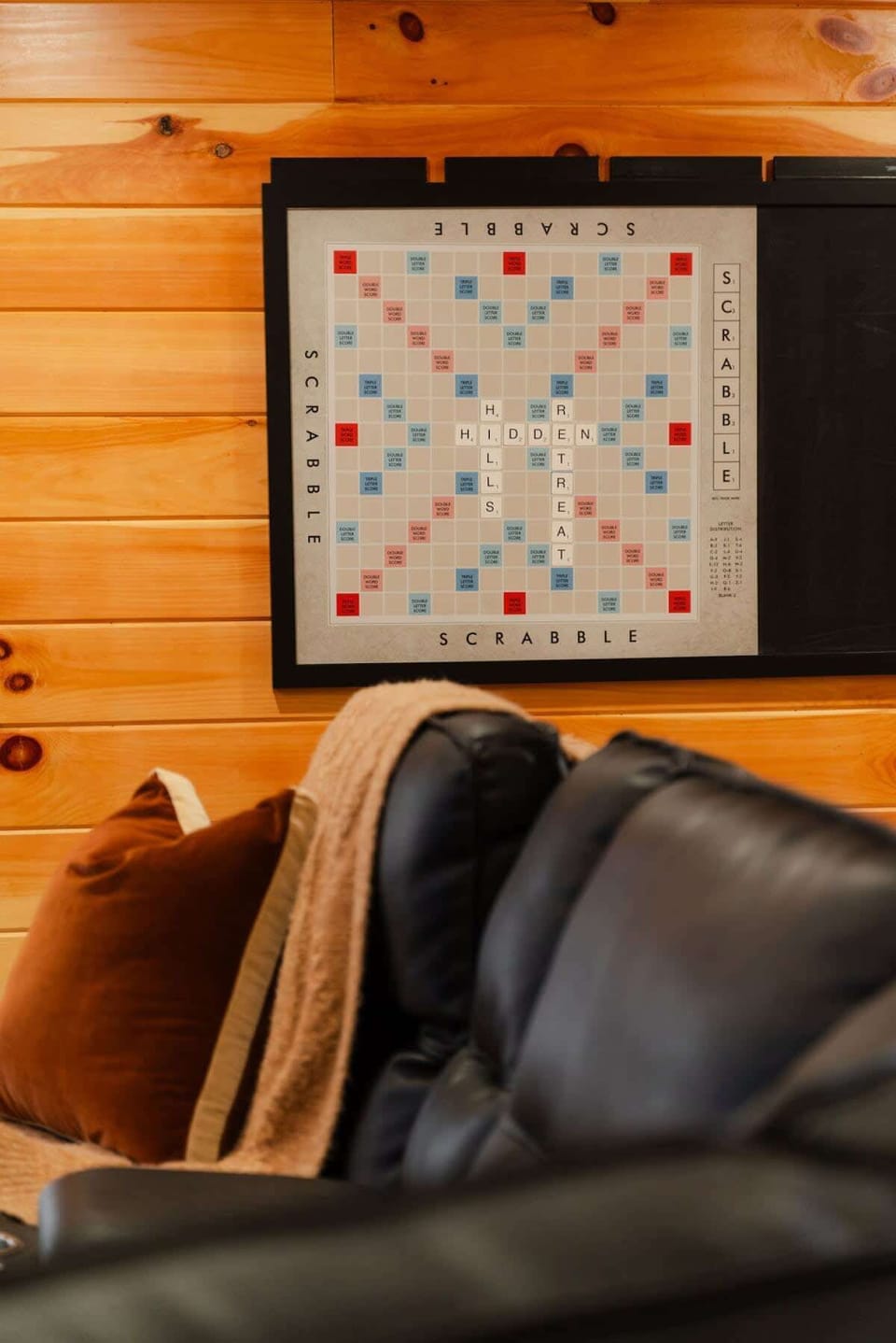 Game Room: Unplug and unwind with Scrabble nights and plush seating in a rustic retreat!