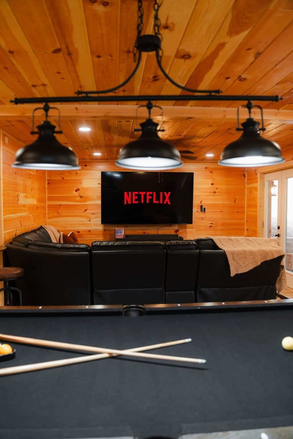 Game Room: Enjoy movie nights with Netflix and game challenges in this fun-filled space!