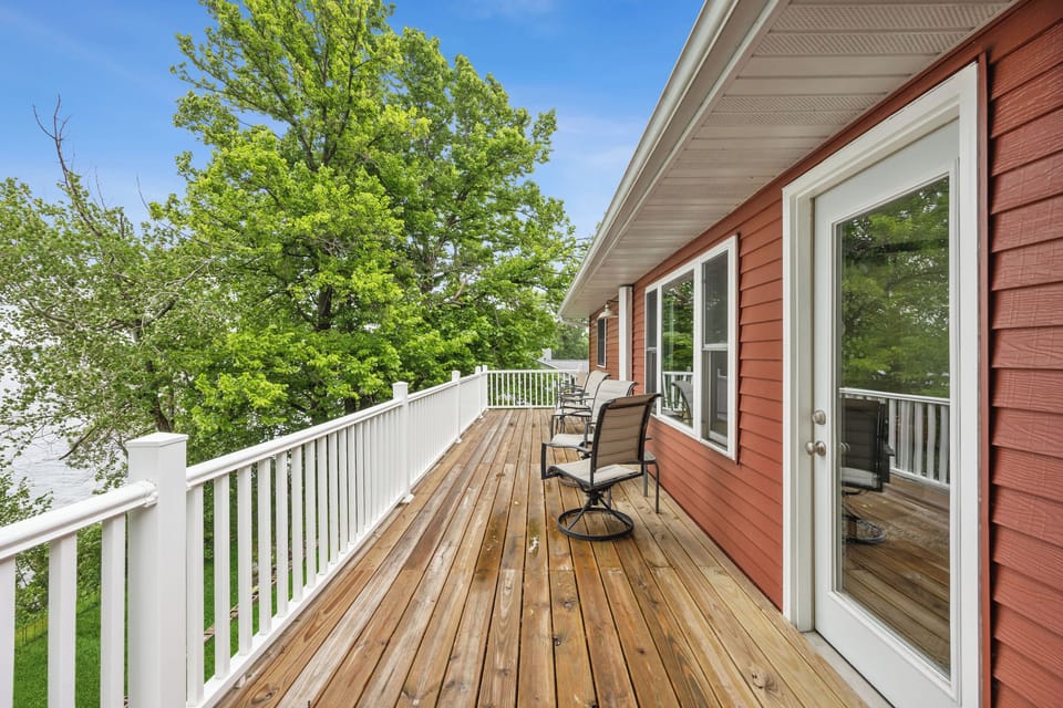 Upper deck is 40' X 8' , has a table for 4 people , 2 swivel chairs and 4 chairs