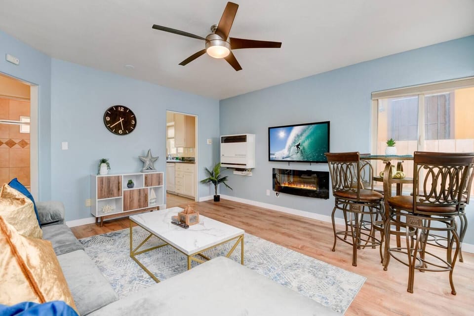 Living Room - Large flat screen television with Roku- which includes live local TV and Netflix. Amazon Prime Video, Hulu and many other channels are available with your own login credentials