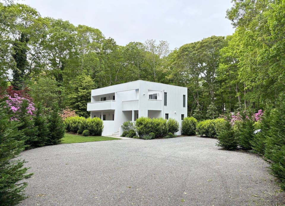 Newly renovated contemporary home, mature landscaping on 1 acre with fencing.