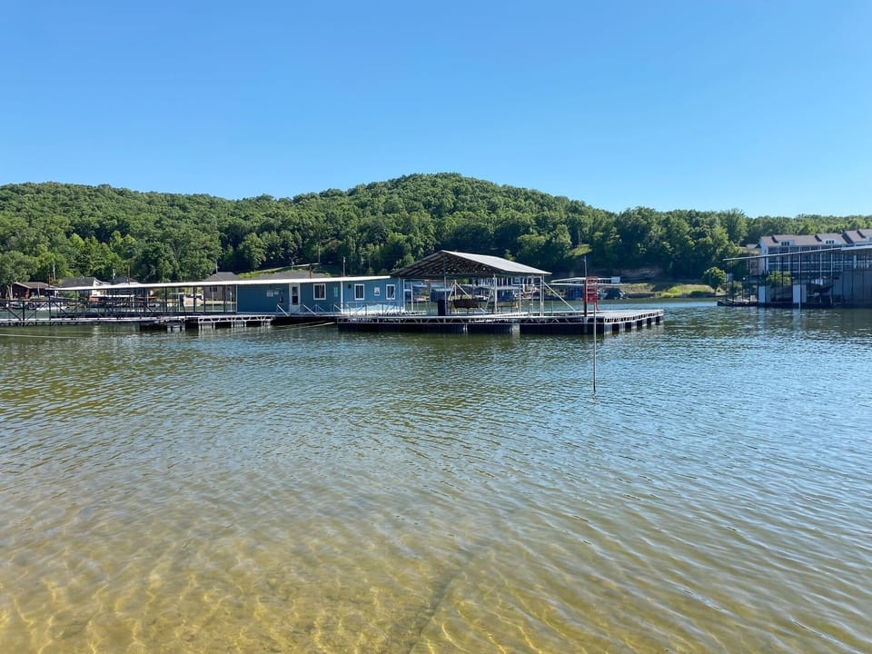 The enclosed fish house and community swim dock.