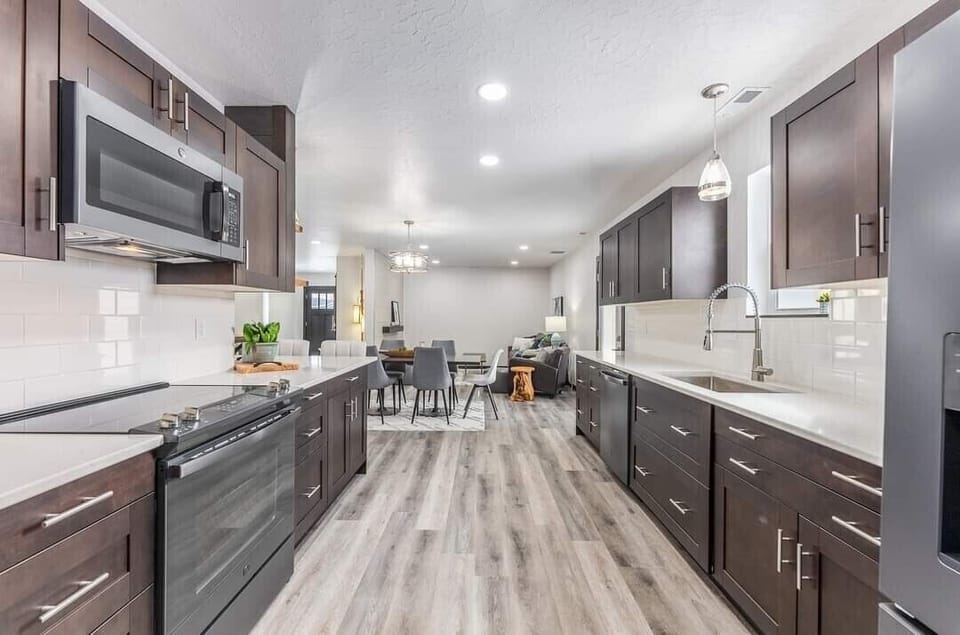 Galley Kitchen with New Appliances
Well supplied for cooking, & eating together.