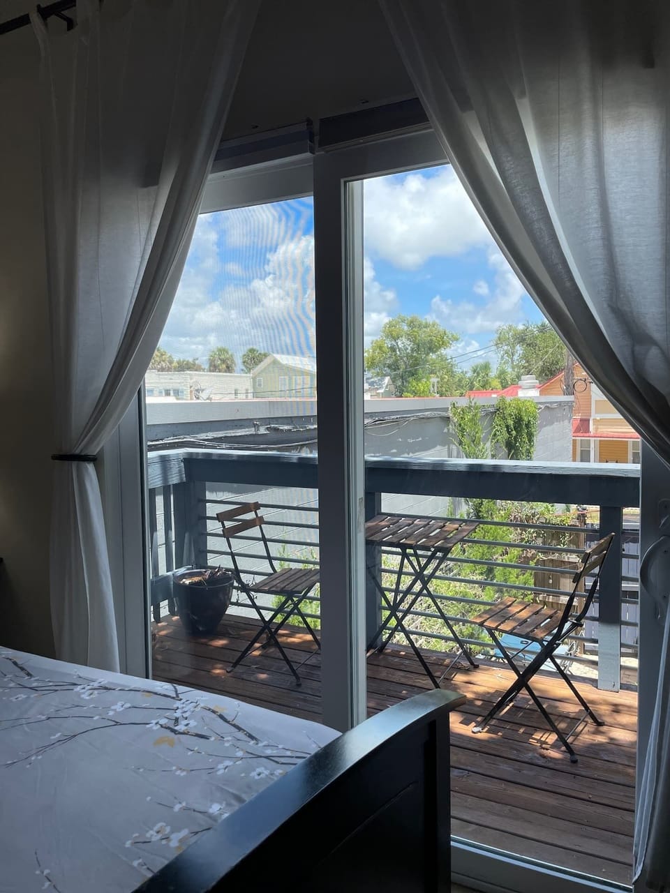 Looking over the balcony into shared courtyard 